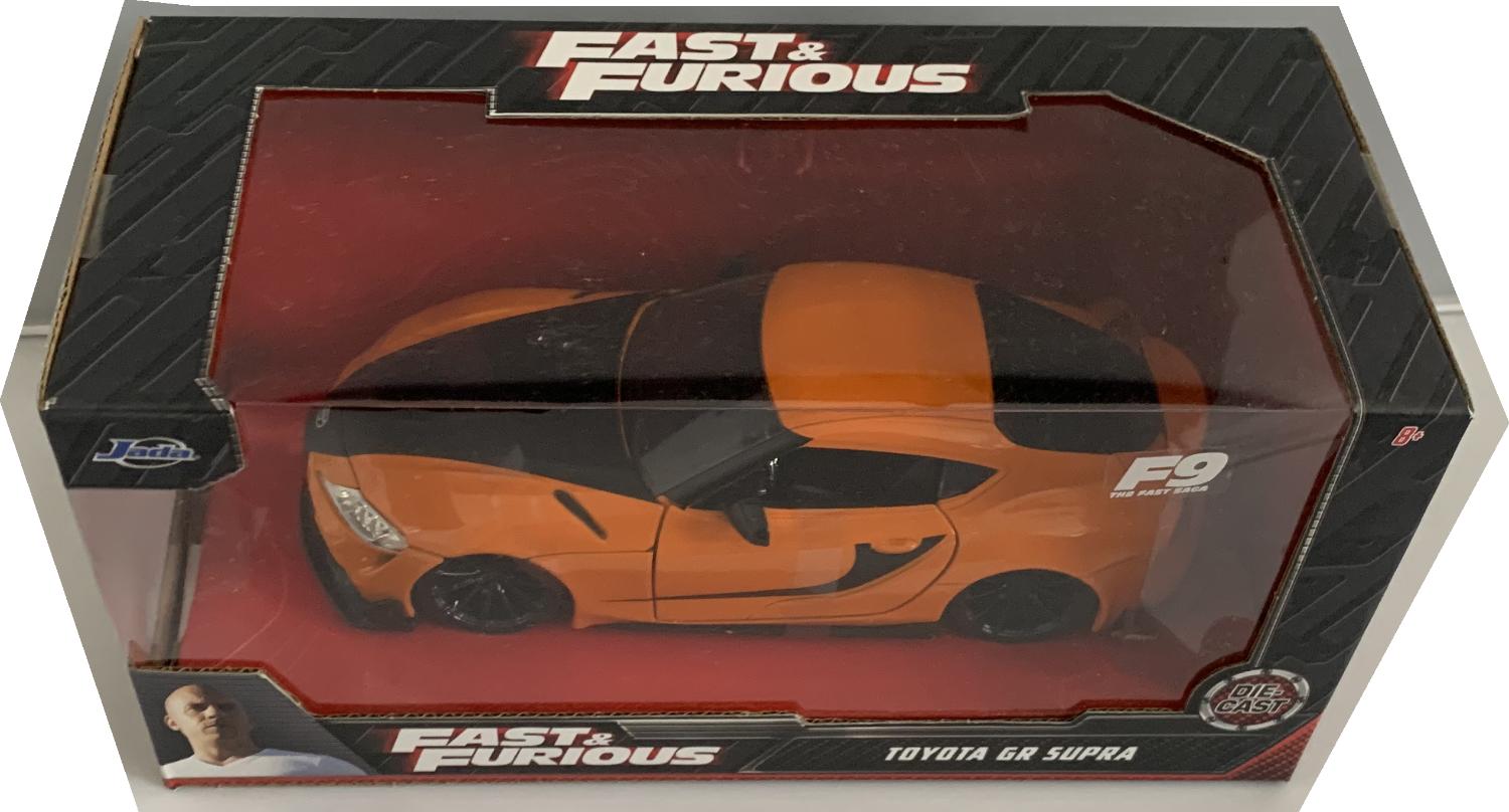 Fast and Furious centered on a series of American action films largely concerned with illegal street racing, heists, spies and betrayal. The model shown here as driven by Han’s is the Toyota GR Supra decorated in orange and black with black wheels.