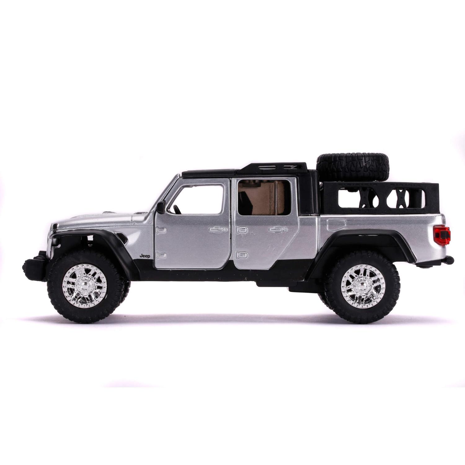 The model shown here as driven by Tej Parker is the Jeep Gladiator decorated in silver with chrome wheels