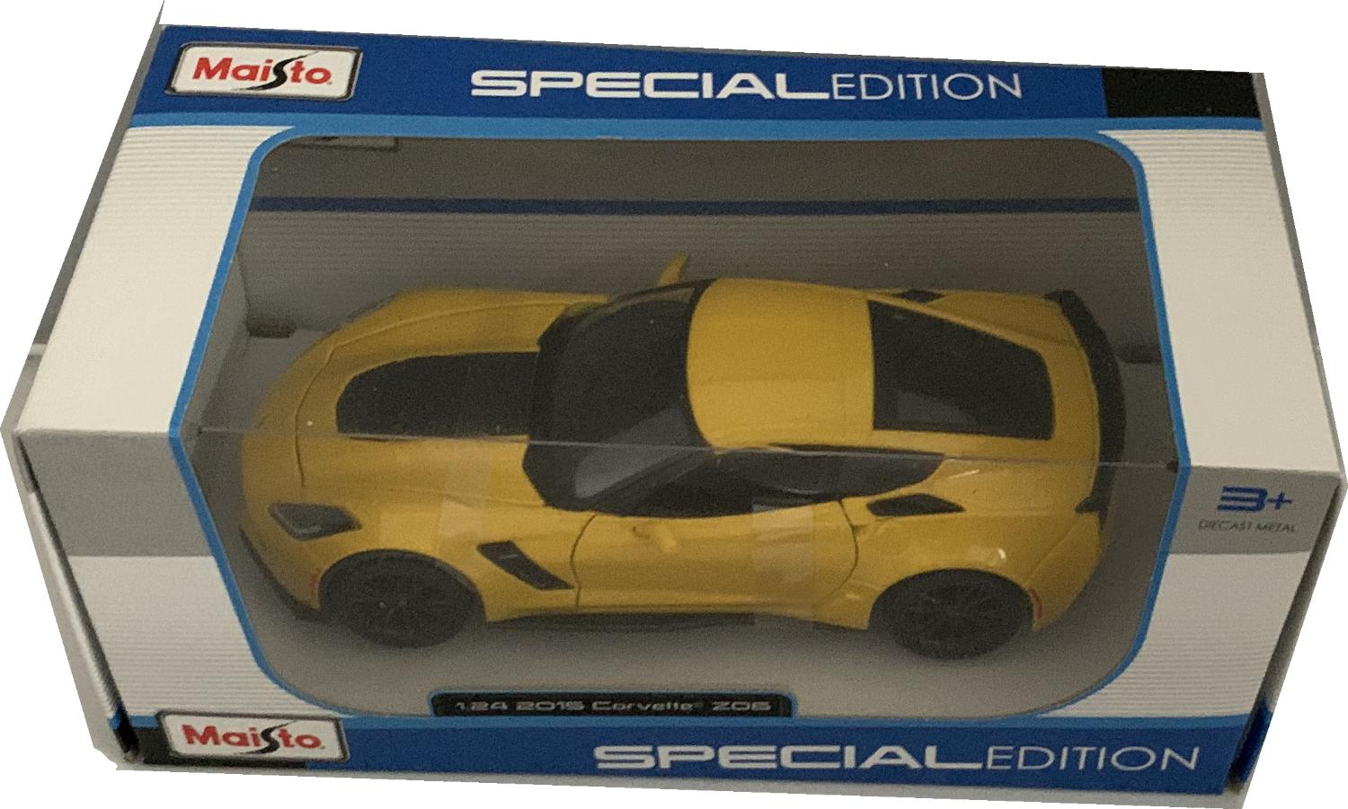 An excellent scale model of a Chevrolet Corvette Z06 decorated in yellow with black wheels