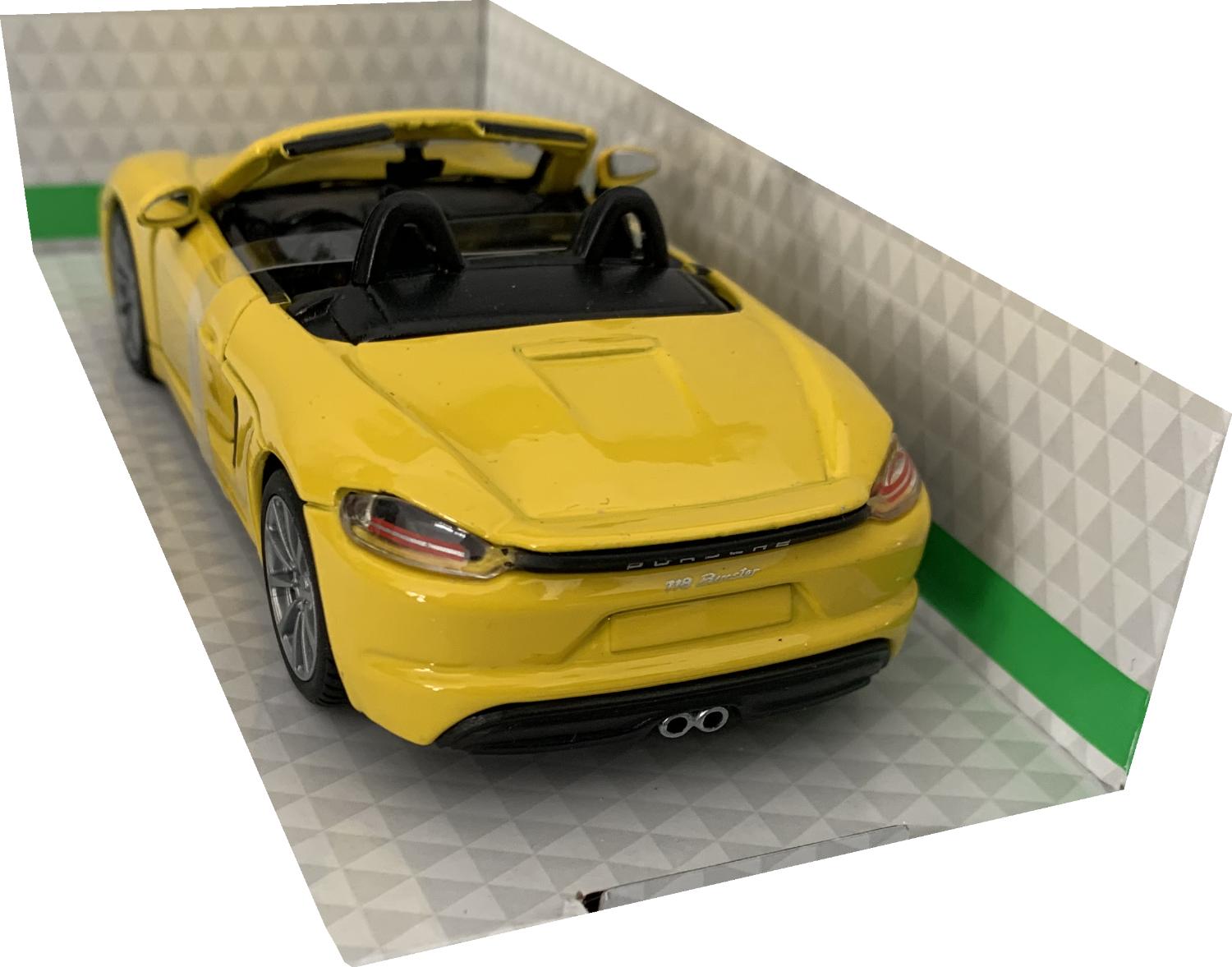 The Porsche 718 Boxster is decorated in yellow with rear spoiler and silver wheels. Other trims are finished in black and silver. Features include opening driver and passenger door