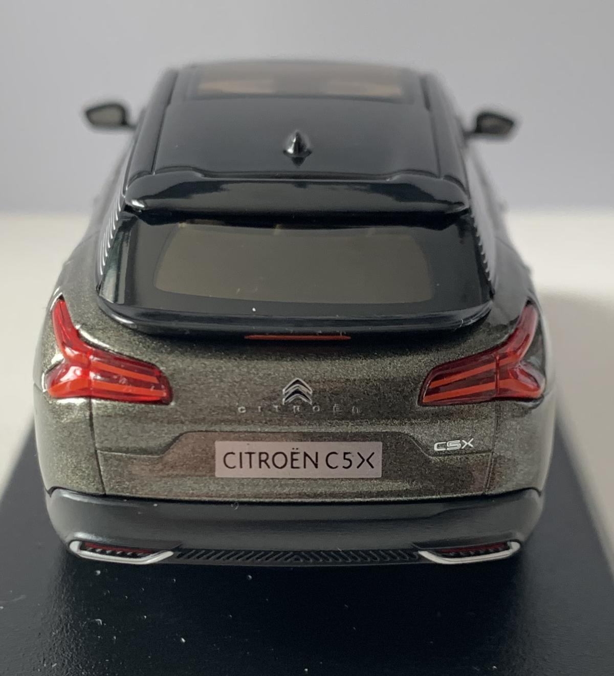 An excellent scale model of a Citroen C5X decorated in amazonite grey with black panoramic roof, rears spoilers, tinted windows, black and silver wheels