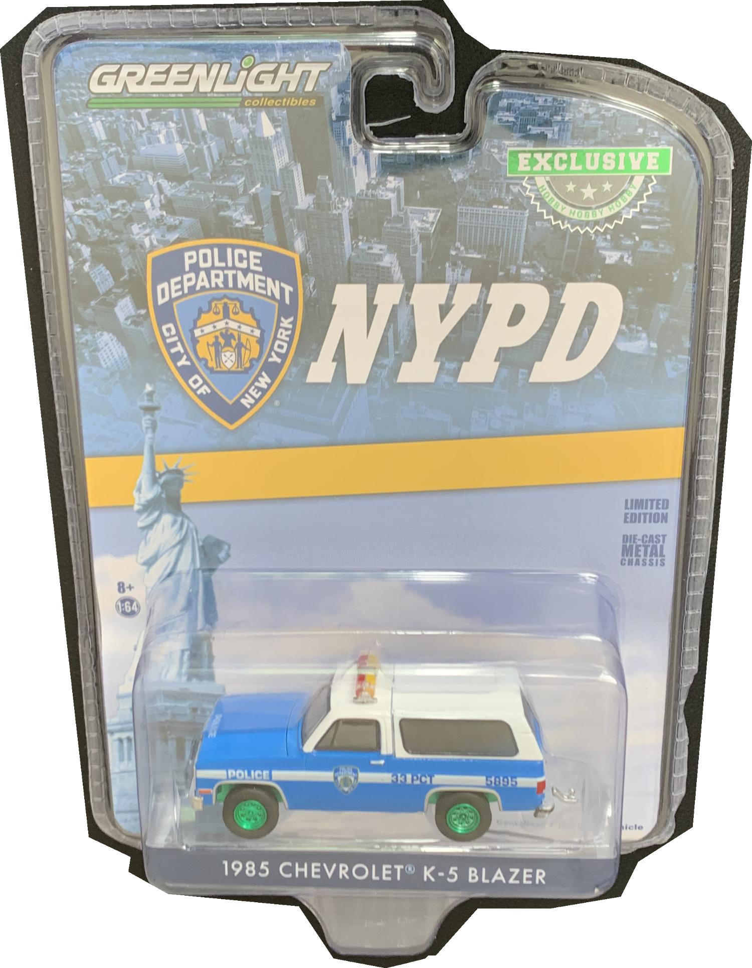 NYPD 1985 Chevrolet K-5 Blazer in blue / white 1:64 scale model from Greenlight, very limited edition model with Green Wheels and underside