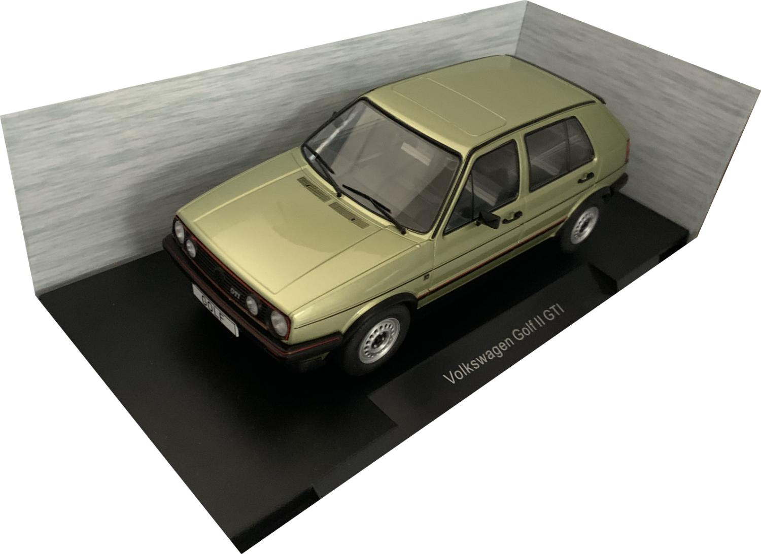 A very good representation of the VW Golf II GTI from 1984 decorated in metallic green with rear top spoiler, silver and black wheels
