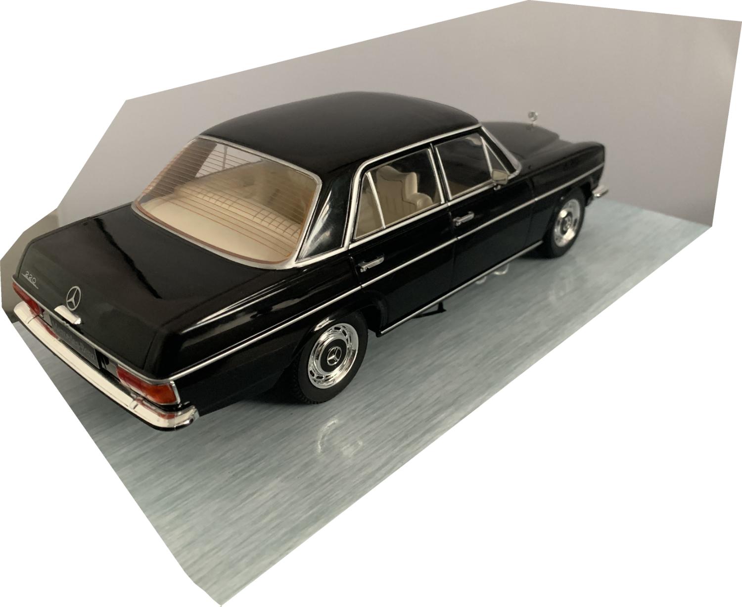 Mercedes Benz 220 D (W115) 1972 in black 1:18 scale model from Model Car Group