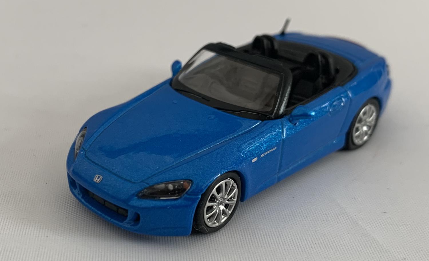 An excellent scale model of a Honda S2000 decorated in Bermuda blue pearl with silver wheels