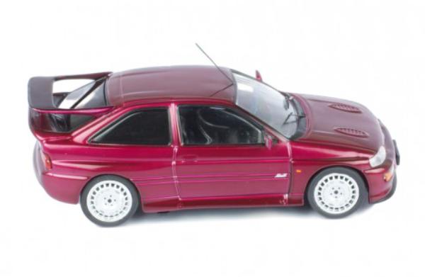 he Ford Escort RS Cosworth, Monte Carlo Edition, is decorated in jewel violet with rear spoilers and silver wheels.