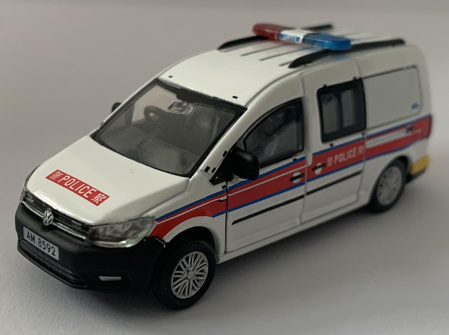 An excellent scale model of a VW Caddy Hong Kong Police decorated in authentic Hong Kong Police livery,