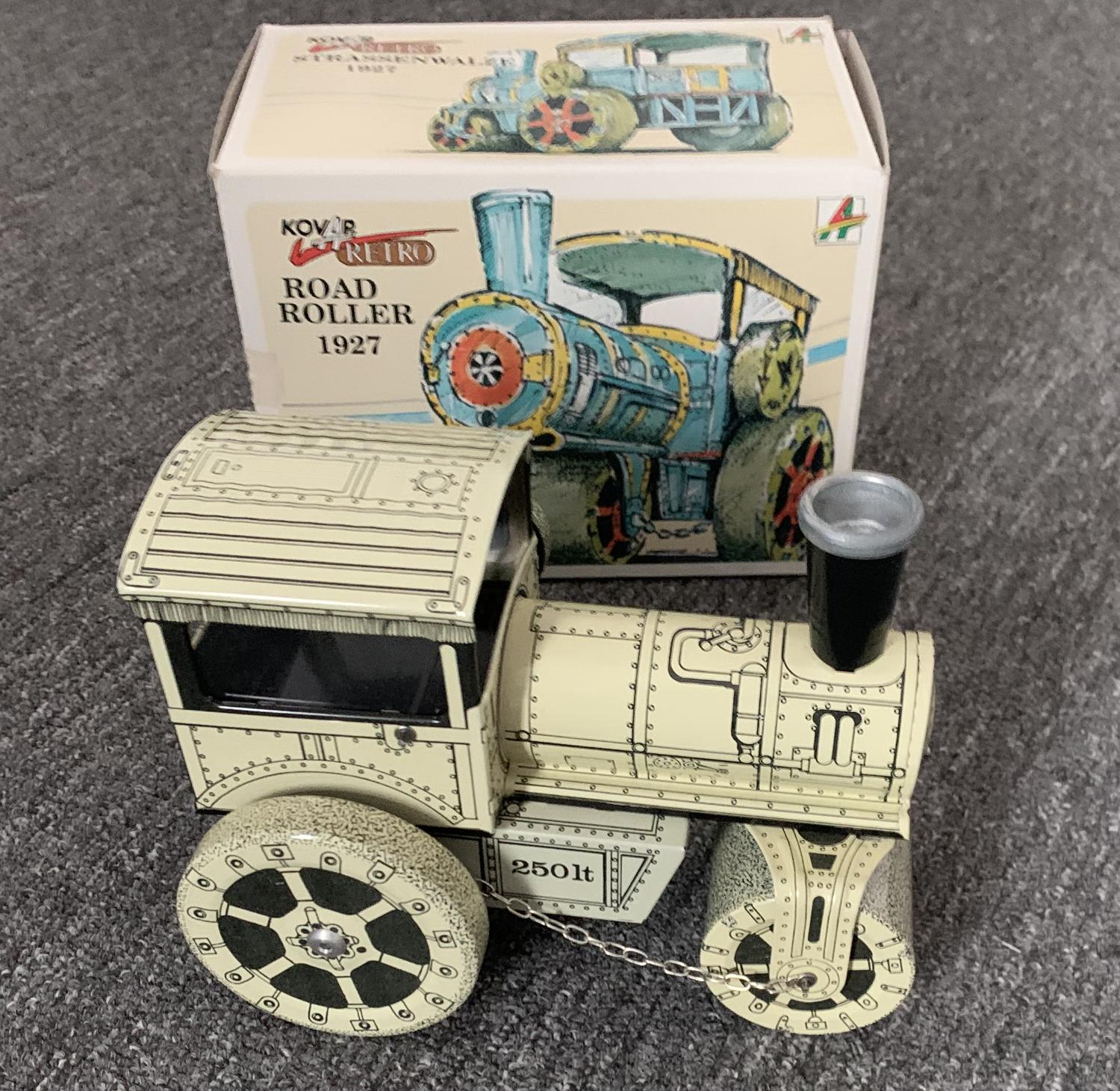 This tinplate clockwork Road Roller is in excellent condition and comes with the key, when wound the Roller moves backwards and forwards. It is supplied in the original box which is in good condition.