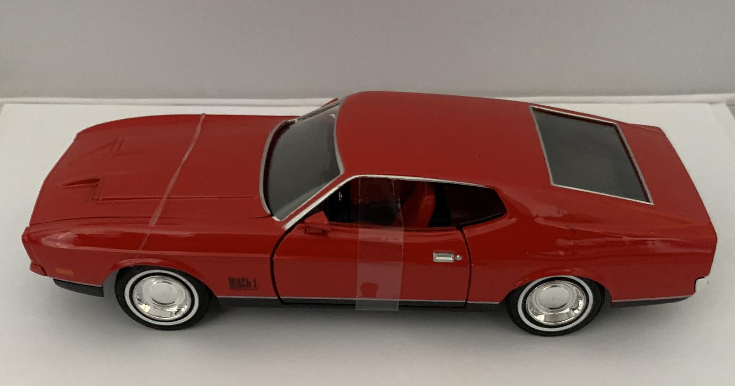 007’s Ford Mustang Mach 1 1971 in red from Diamonds are Forever 1:24 scale model from Motormax, James Bond 60 Years of Bond