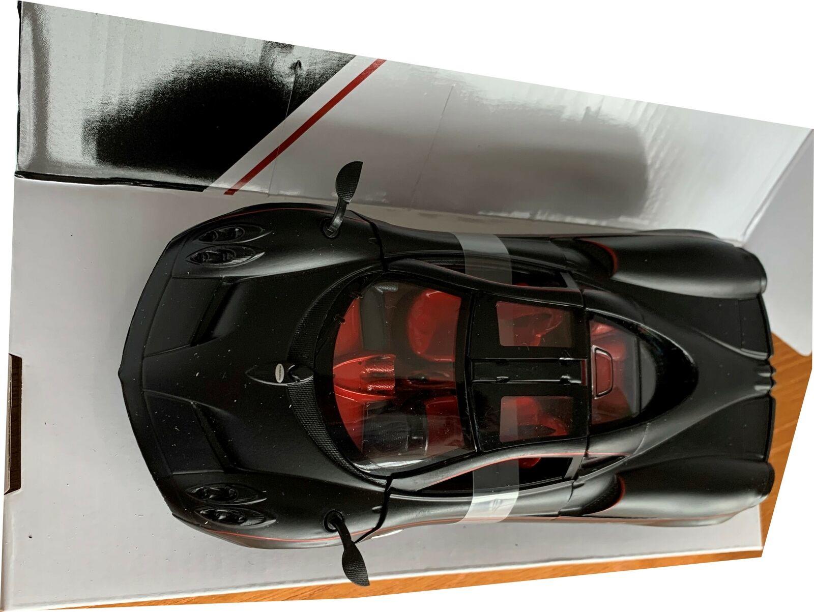 Pagani Huayra in matt black 1:24 scale diecast sports car model from motormax