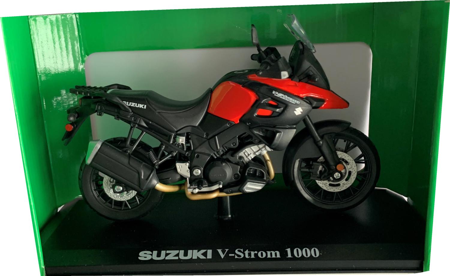 Suzuki V-Strom 1000 in red / black 1:12 scale model from Maisto, mounted on a plinth and presented in a green Suzuki themed box