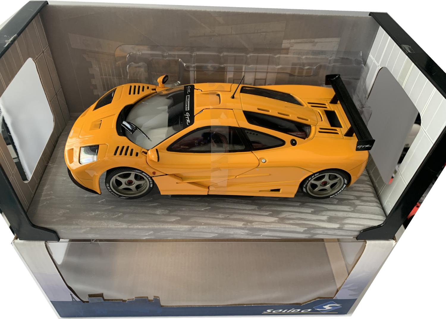 very good representation of the McLaren F1 GTR decorated in orange papaya with authentic graphics and high rear spoiler.