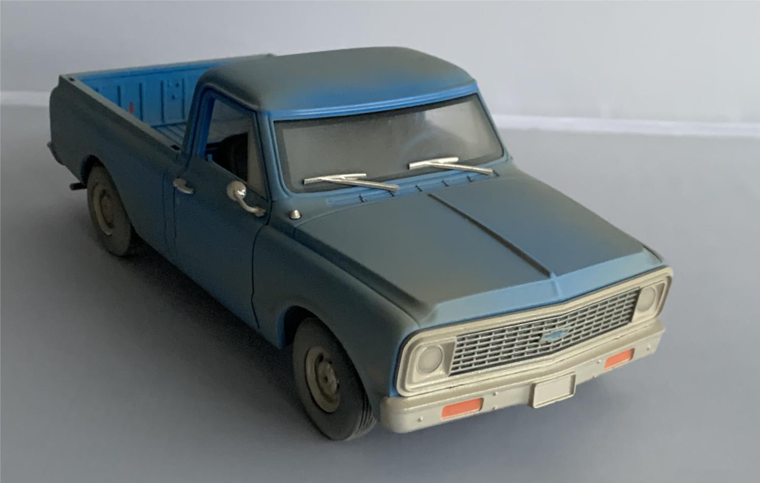 From the 1974 American horror film which followed a group of friends who fall victim to a family of cannibals while on their way to visit an old homestead.  The model shown here is a very good representation of Chevrolet C10 decorated in light blue with a dusty finish,
