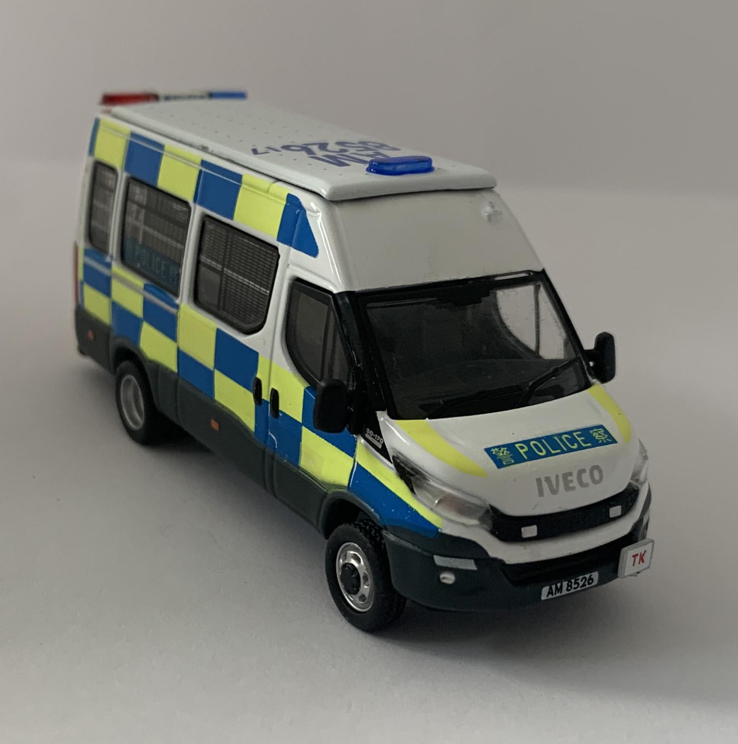 An excellent scale model of an Iveco Daily Hong Kong Police (Traffic) decorated in authentic Hong Kong Police livery, authentic graphics and silver wheels