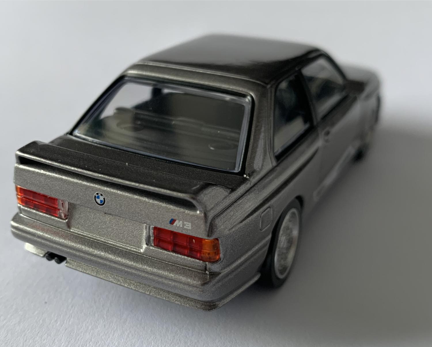 A good replica of the BMW M3 decorated in silver with high rear spoiler and silver wheels.