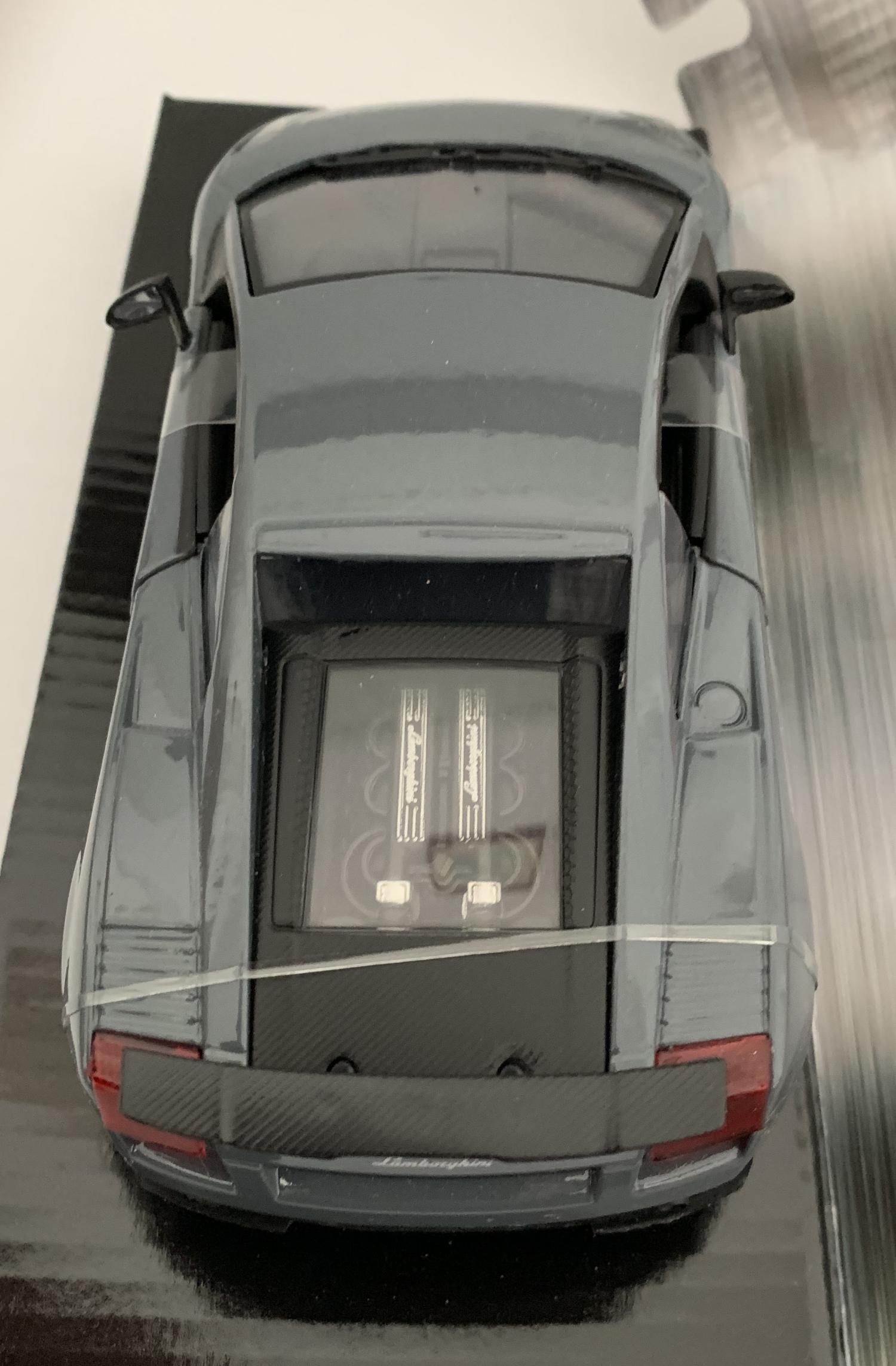 An excellent scale model of a Lamborghini Gallardo Superleggera decorated in grey with authentic graphics, rear spoiler