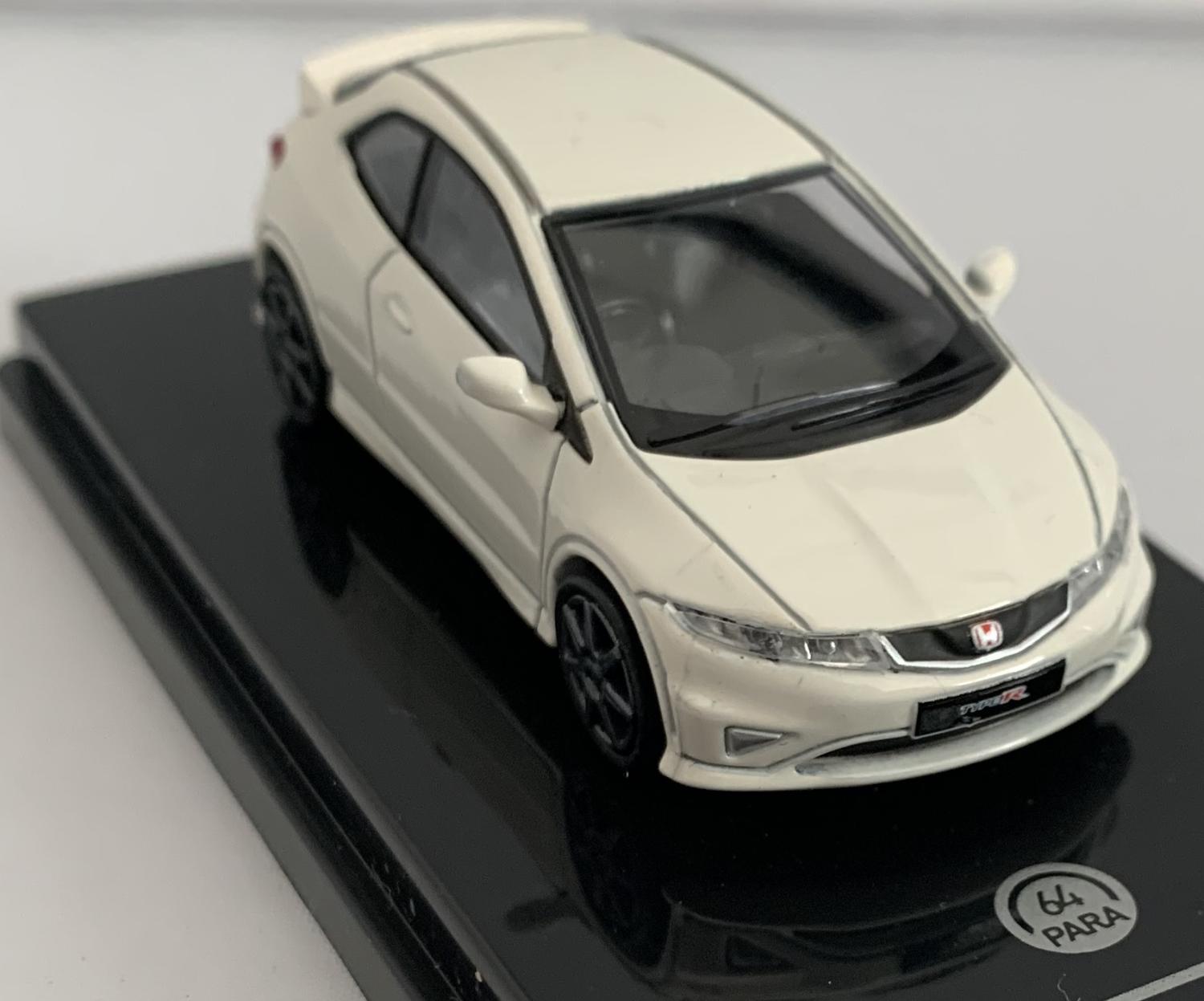 An excellent scale model of a Honda Civic Type R decorated in championship white with dark grey wheels and spoiler