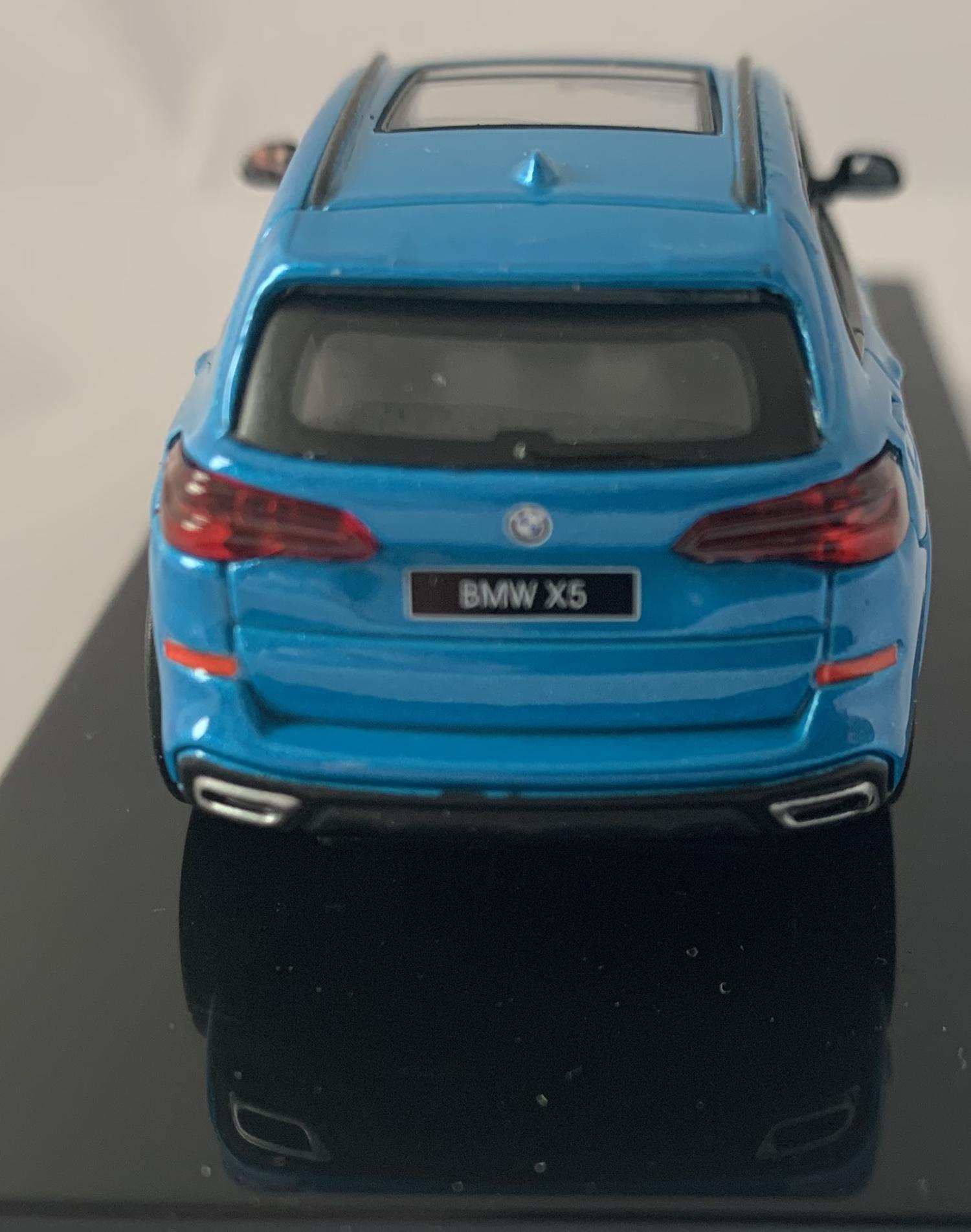 n excellent scale model of a BMW X5 decorated in atlantis with panoramic roof, roof rails and silver wheels.