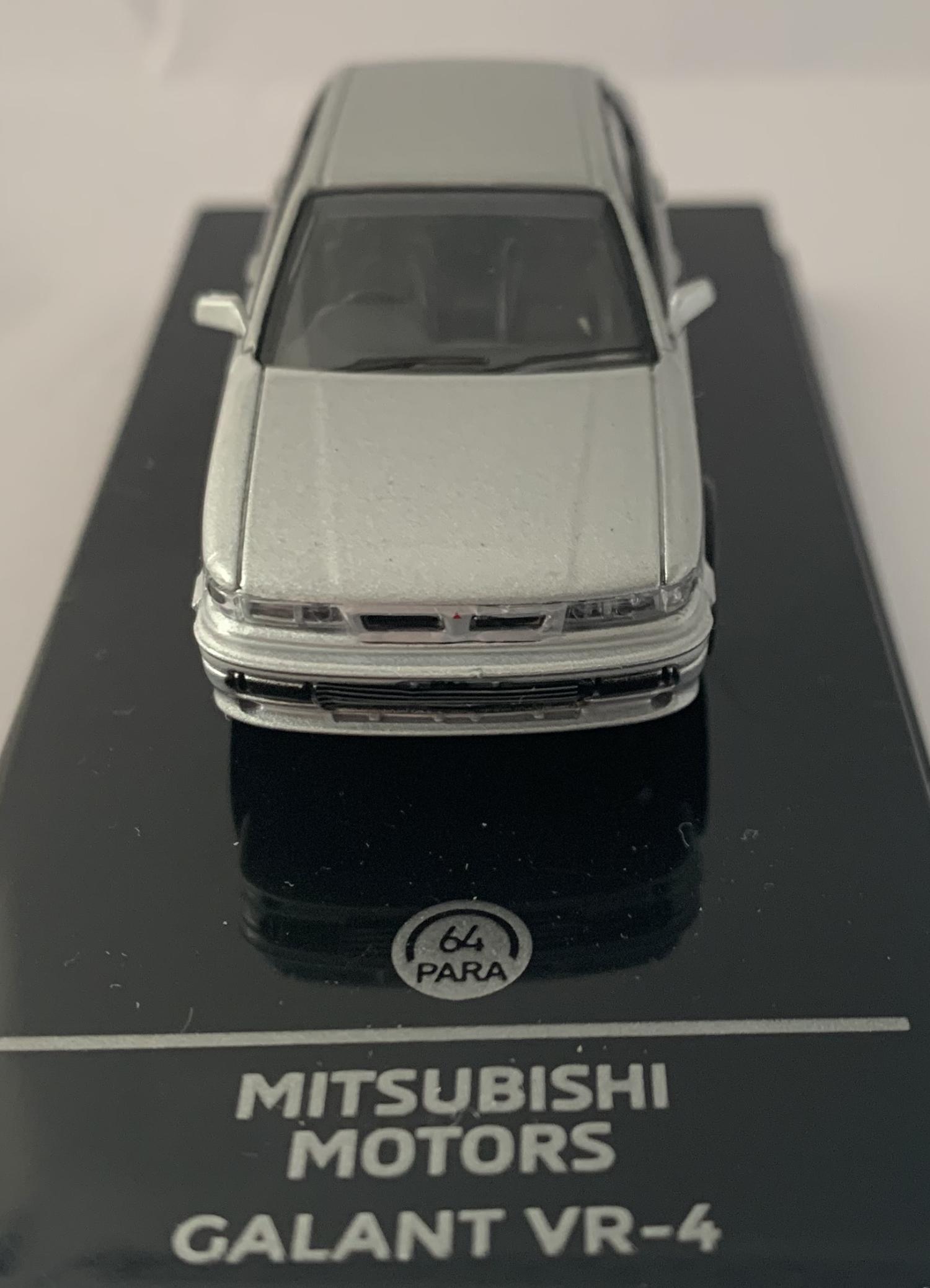 A good reproduction of the Mitsubishi Motors Galant VR-4 mounted on a removable plinth and a removable hard plastic cover