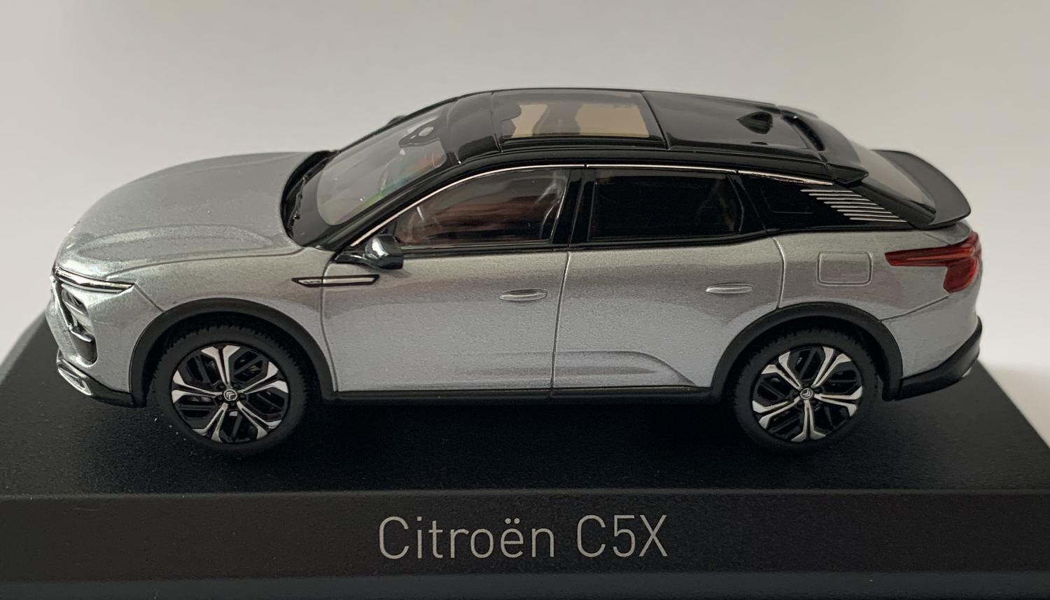 An excellent scale model of a Citroen C5X decorated in artense grey with black panoramic roof, rears spoilers, tinted windows, black and silver wheels
