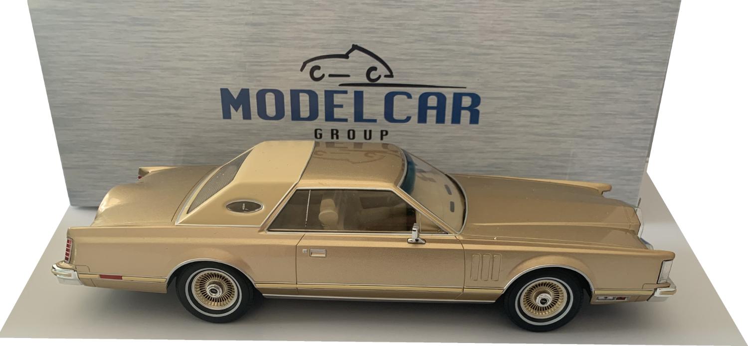 A very good representation of the Lincoln Continental mk5 decorated in gold and cream,