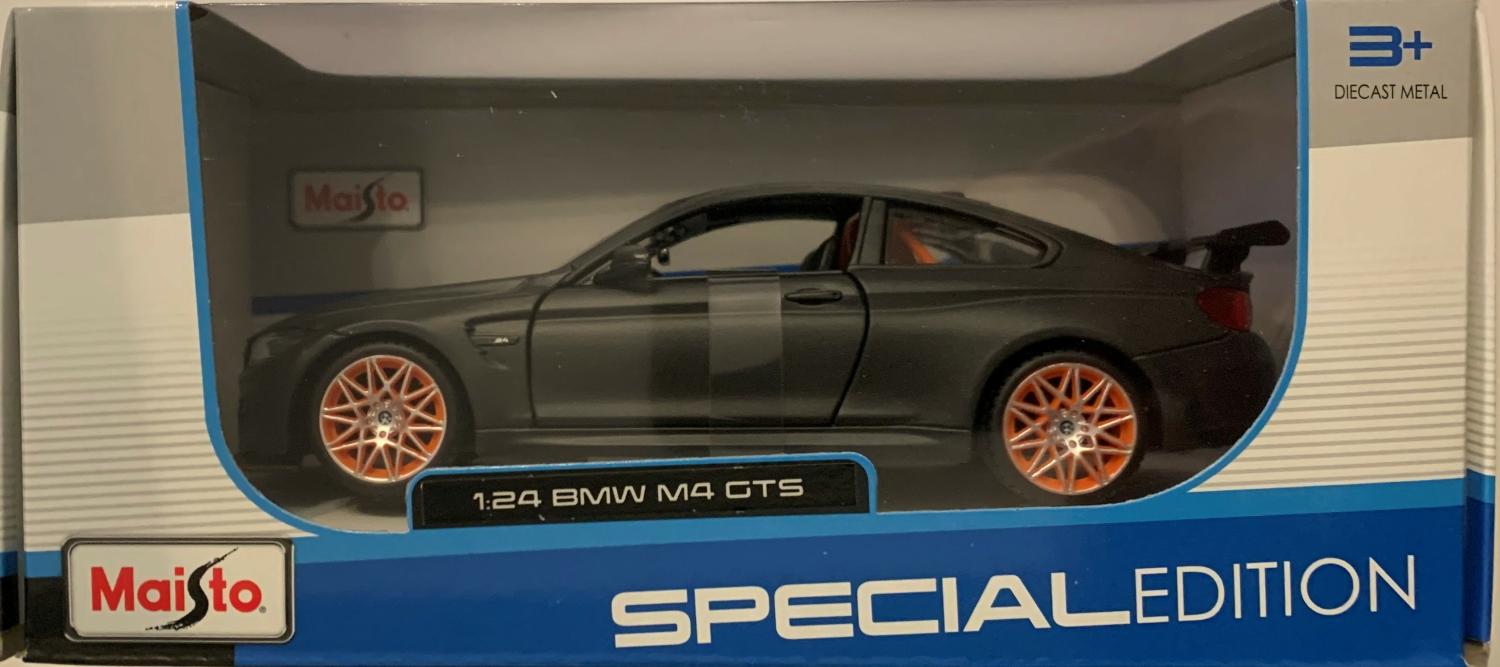 The model is mounted on a removable plinth and presented in a window display box, the car is approx. 20 cm long and the presentation box is 23 cm long