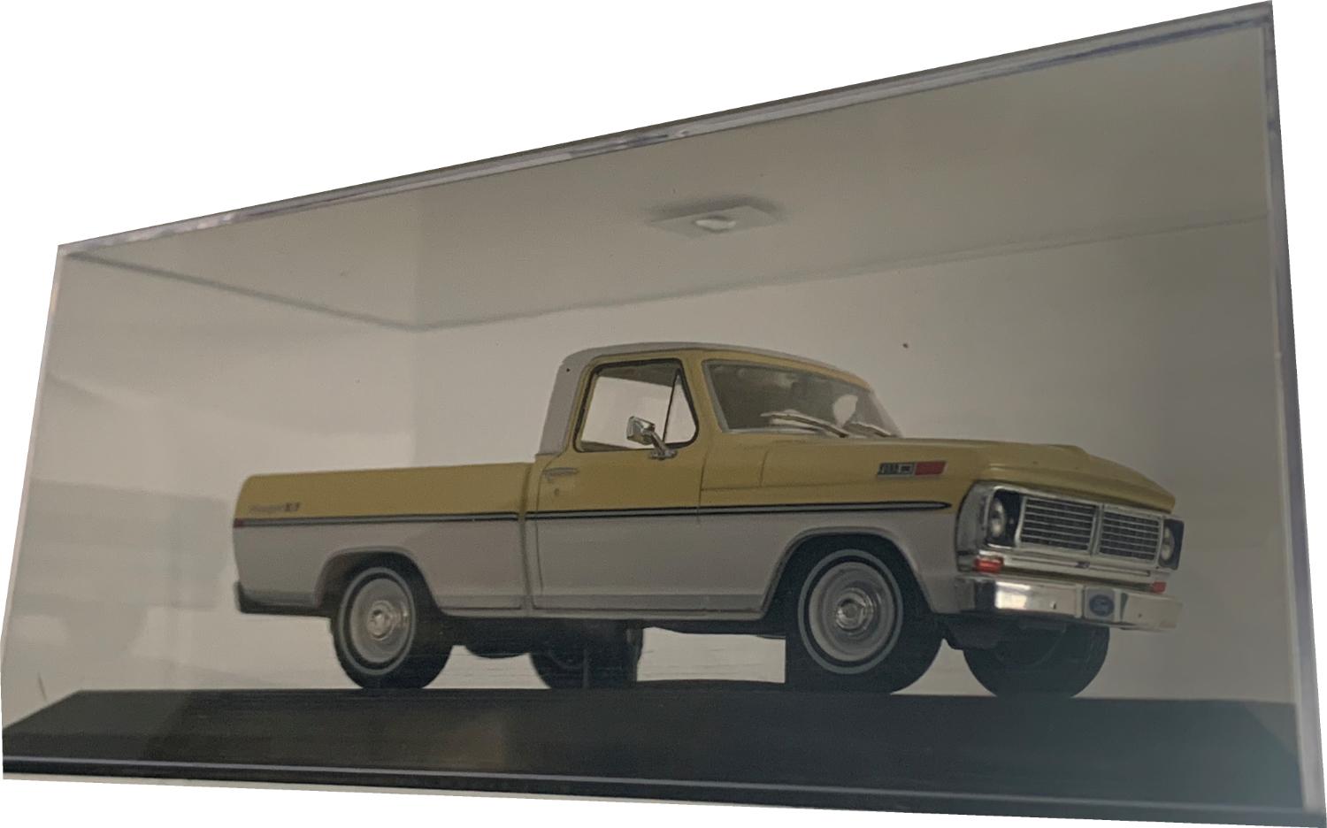 An excellent scale model of the Ford F-100 with high level of detail throughout, all authentically recreated.  Model is mounted on a removable plinth with a removable hard plastic cover.