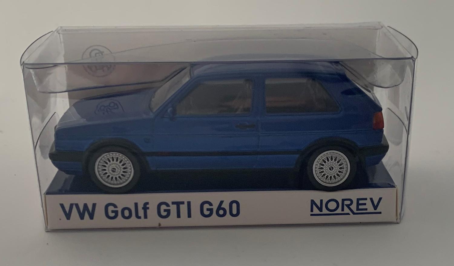 A good replica of the VW Golf GTI G60 decorated in metallic blue with silver wheels