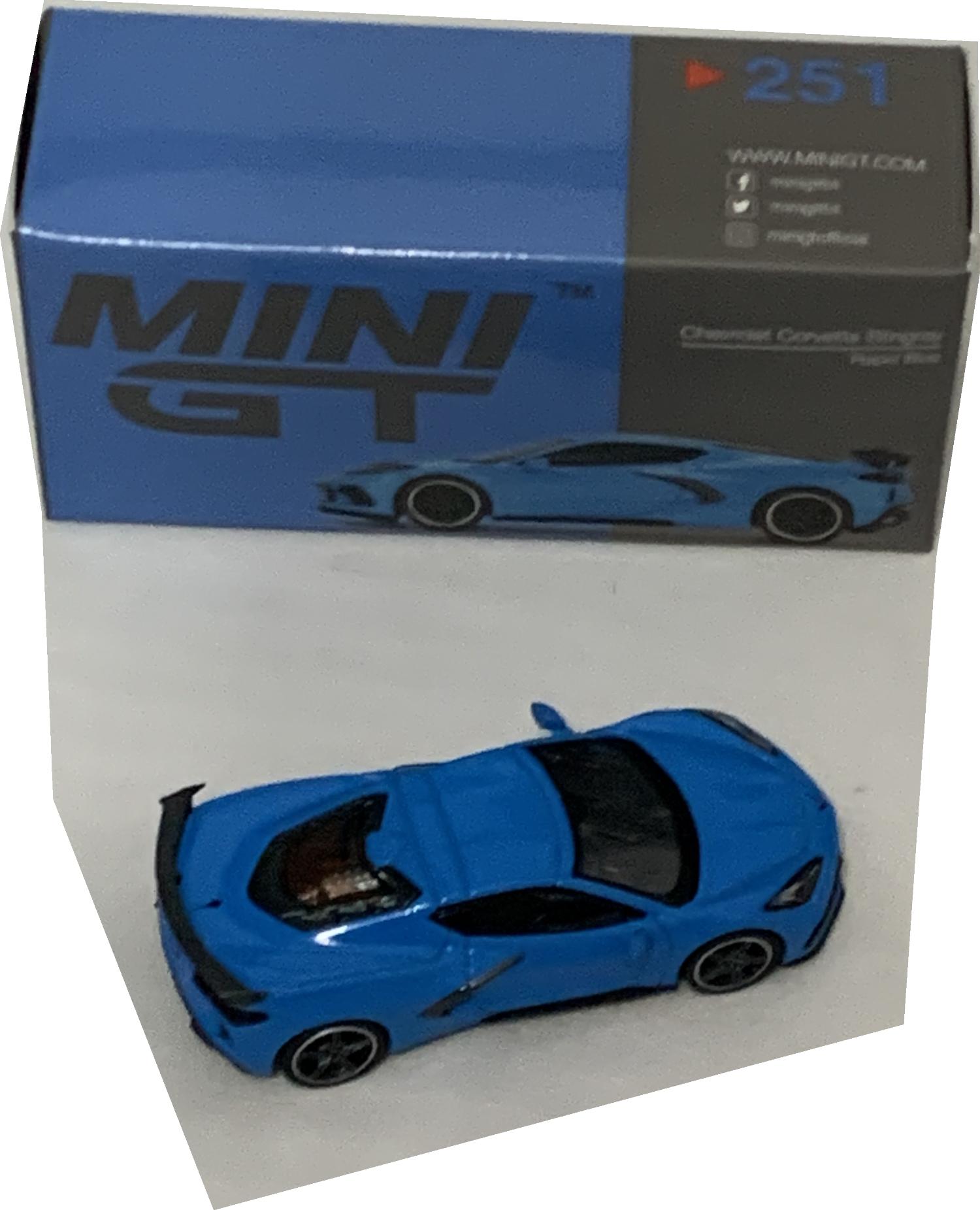 An excellent scale model of a Chevrolet Corvette Stingray decorated in rapid blue with high rear spoiler, side air vents