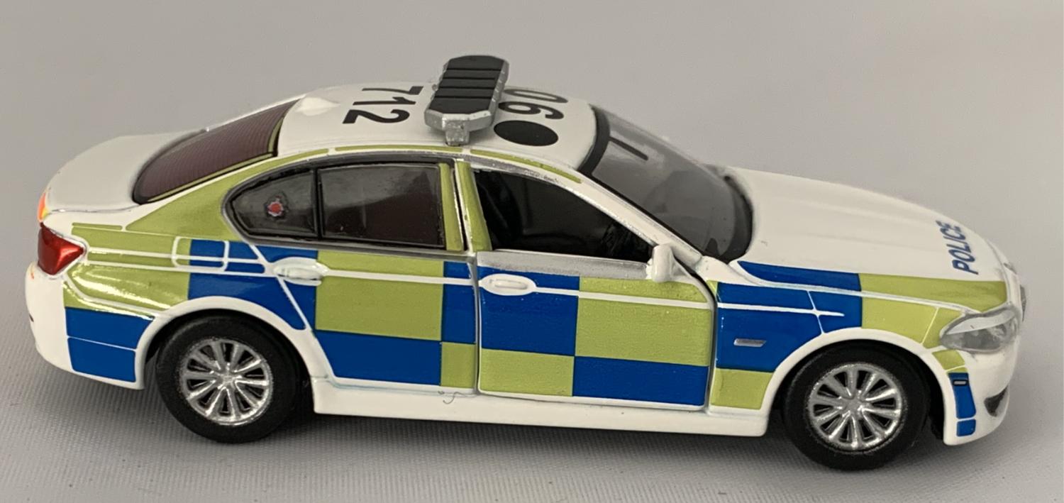 An excellent scale model of a BMW 5 Series decorated in Greater Manchester authentic Police livery with the addition of roof beacons
