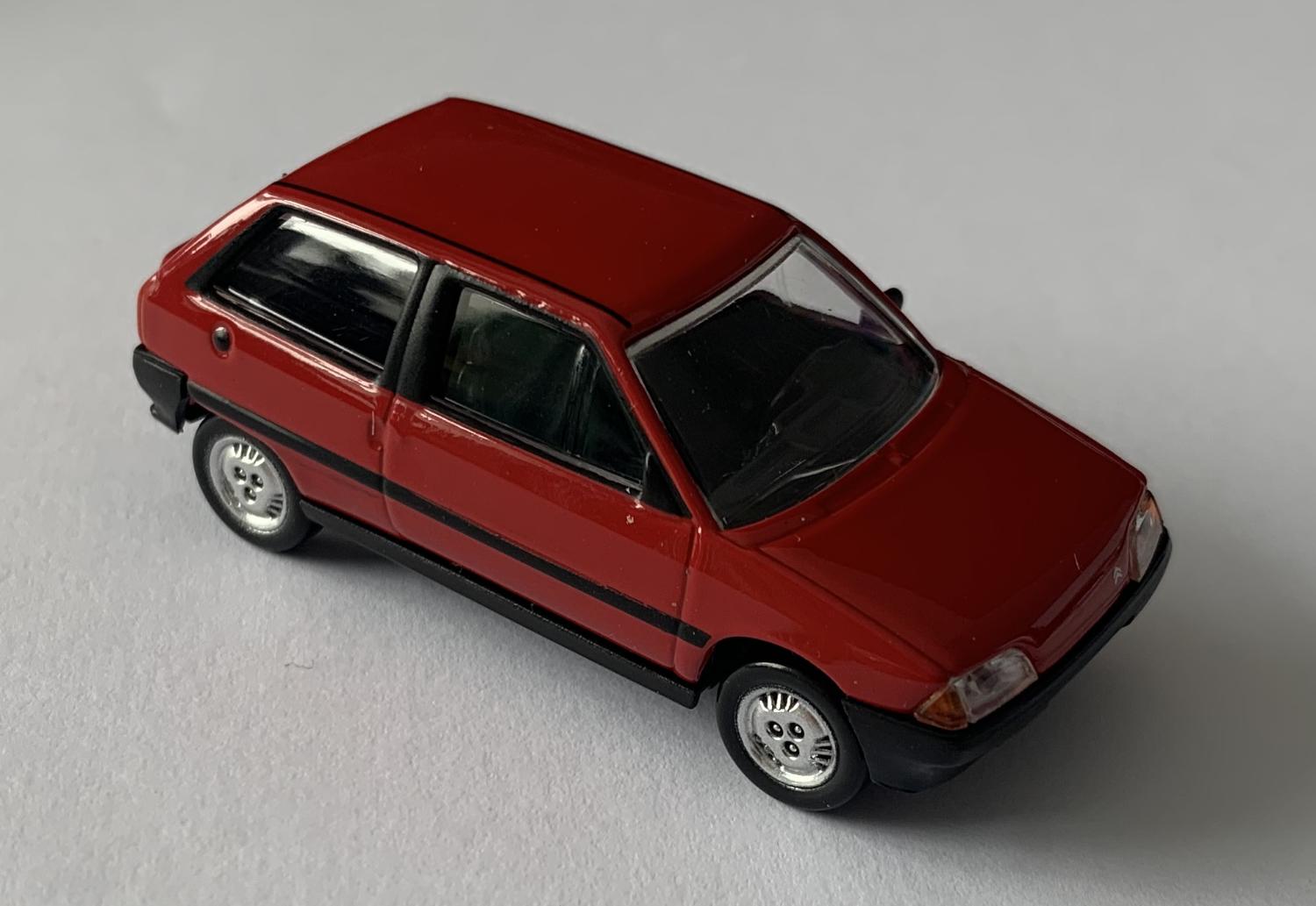 Citroen AX 1986 in red 1:64 scale model car from Norev, 310920