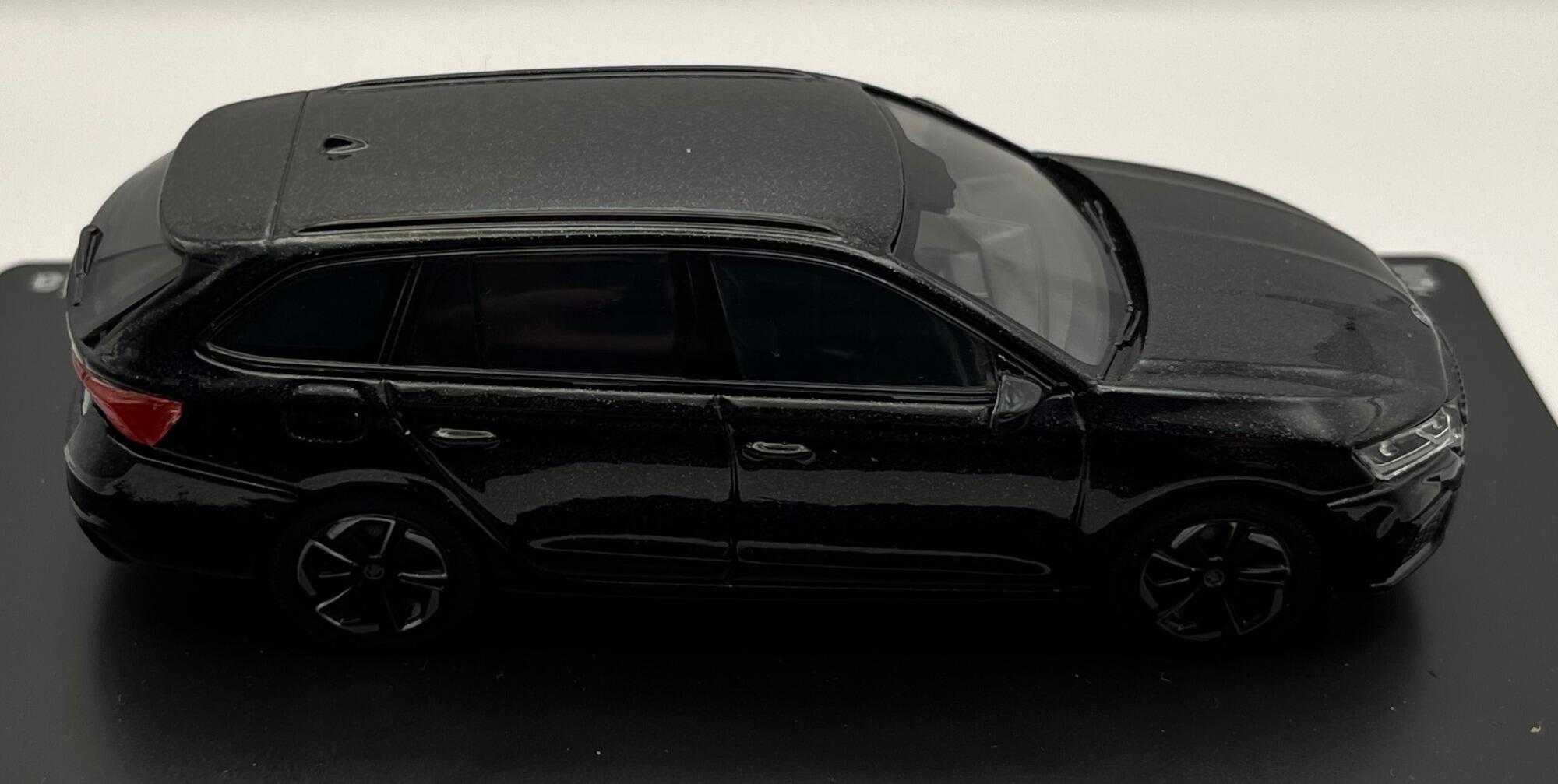 Skoda Octavia IV Estate RS 2020 in metallic black magic, 1:43 scale diecast car model from Abrex, ABR143039D