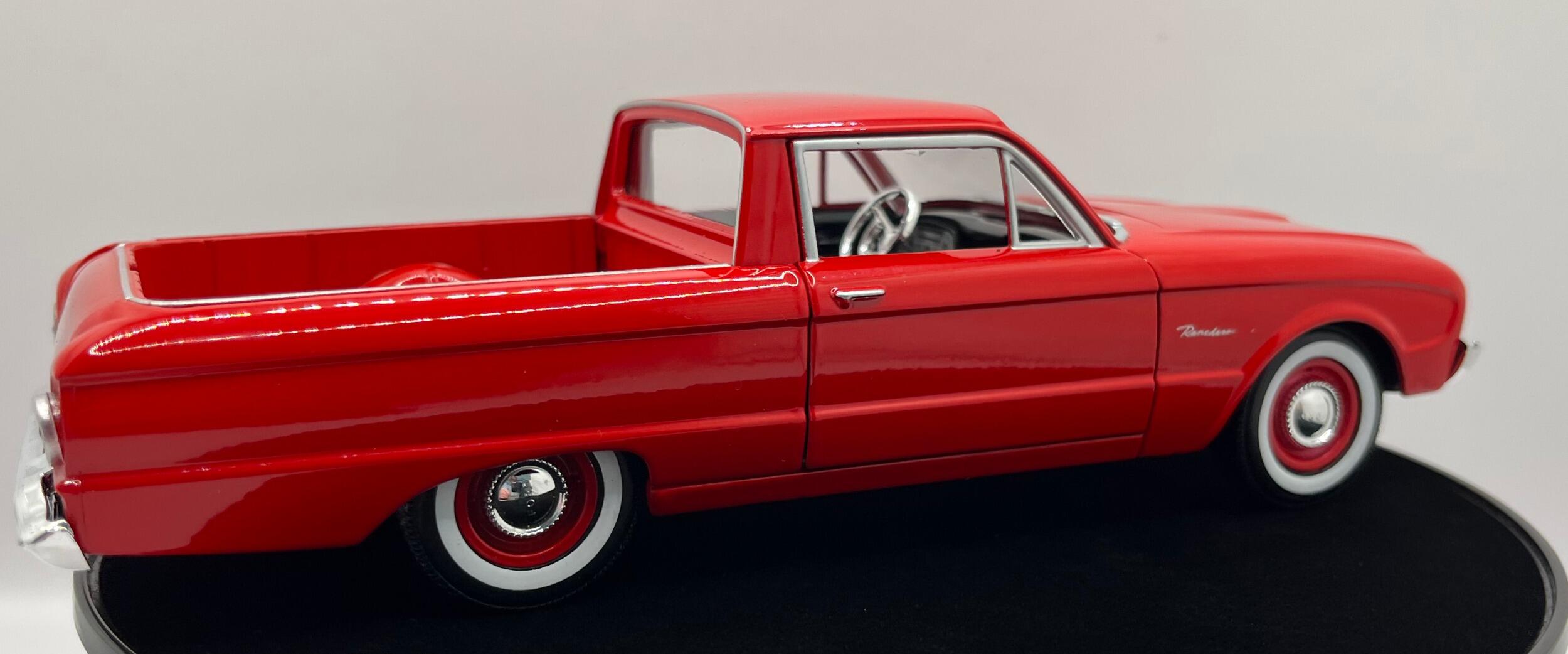 An excellent scale model of a Ford Ranchero decorated in red, chrome and red wheels with white rims. Other trims are finished in chrome and silver.