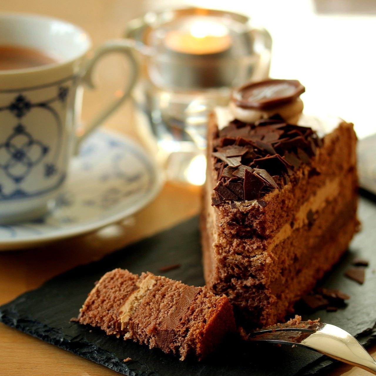 Slice of Chocolate Cake with a Cup of Tea