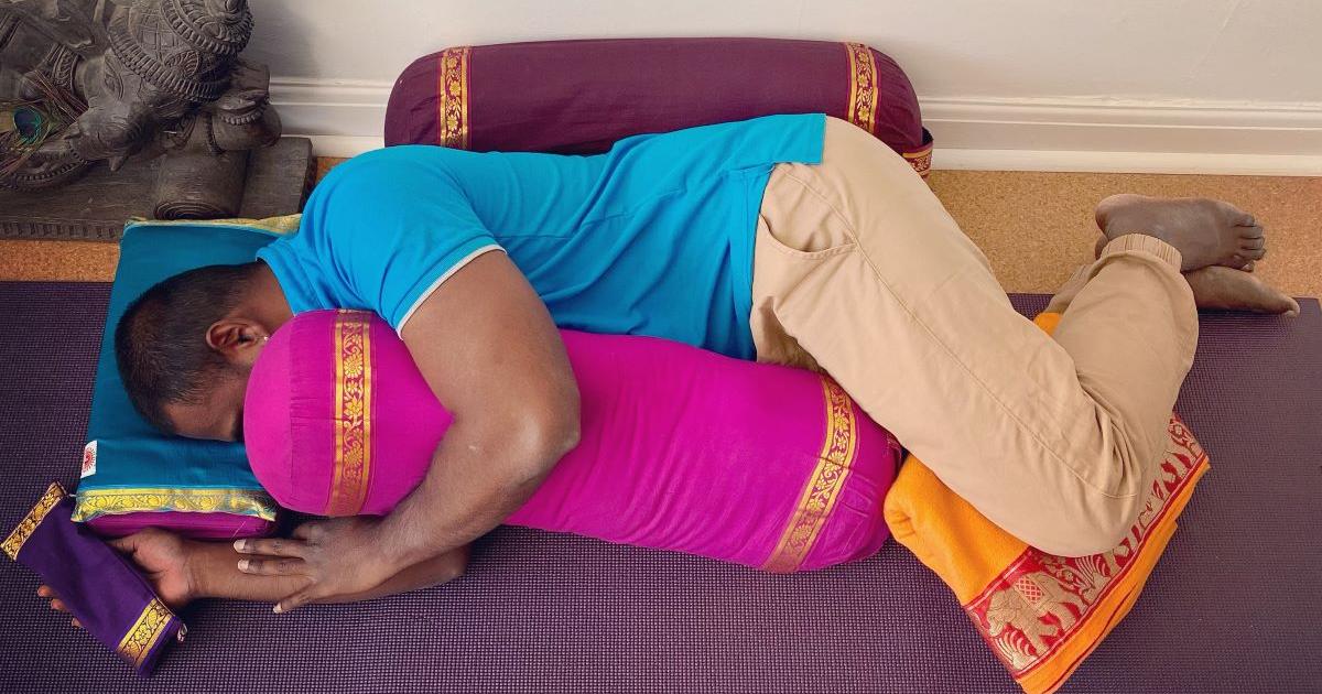 How to use a yoga bolster in side lying restorative yoga