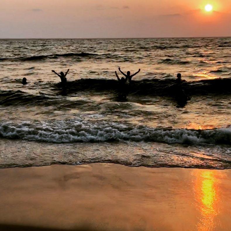 yoga retreat India sun set at beach