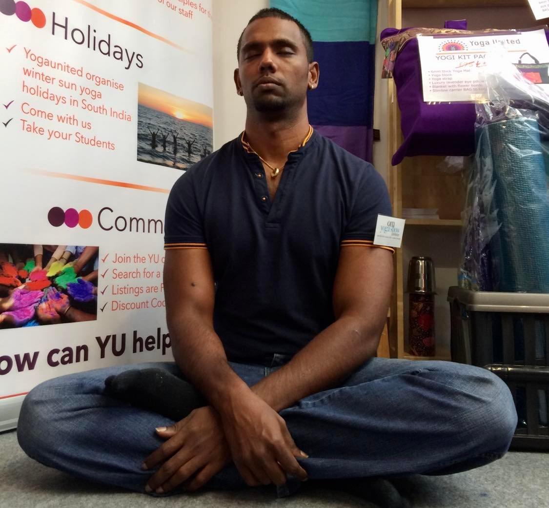 Saz sits for a meditation break at the London Yoga Show