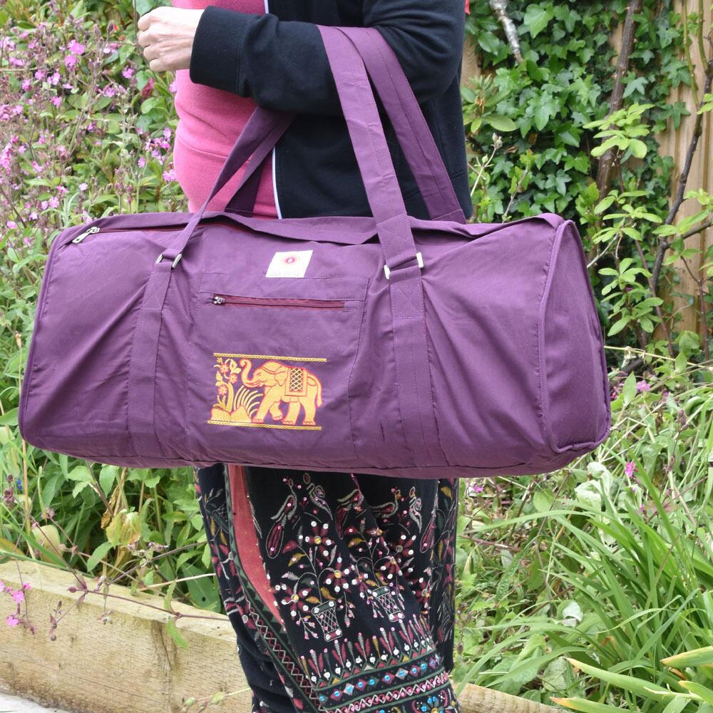 Sutra Elephant Cotton Yoga Kit Bag by Yoga United- Aubergine colour holding
