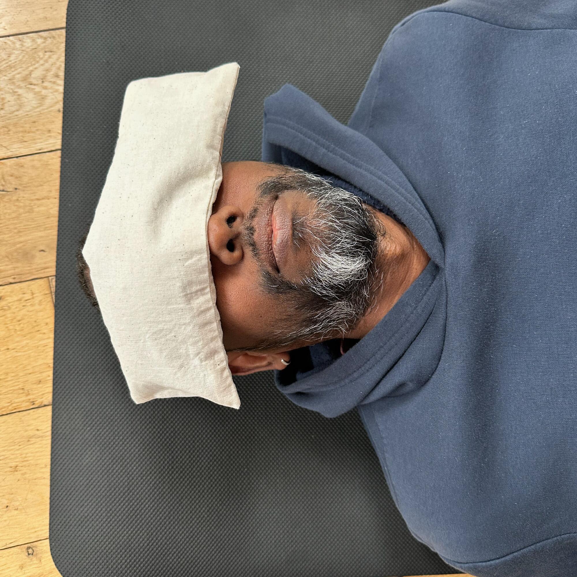 Natural yoga eye pillow in relaxation