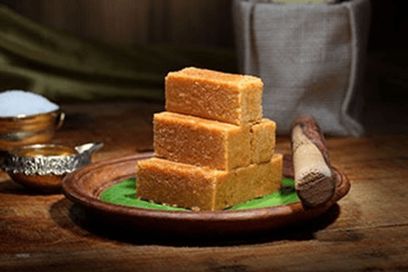 Product photo of Spl Mysore Pak. A very traditional Indian Sweets available from the interiors of India.