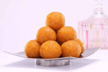 Product photo of Mothi chur Laddu. A very traditional Indian Sweets available from the interiors of India.