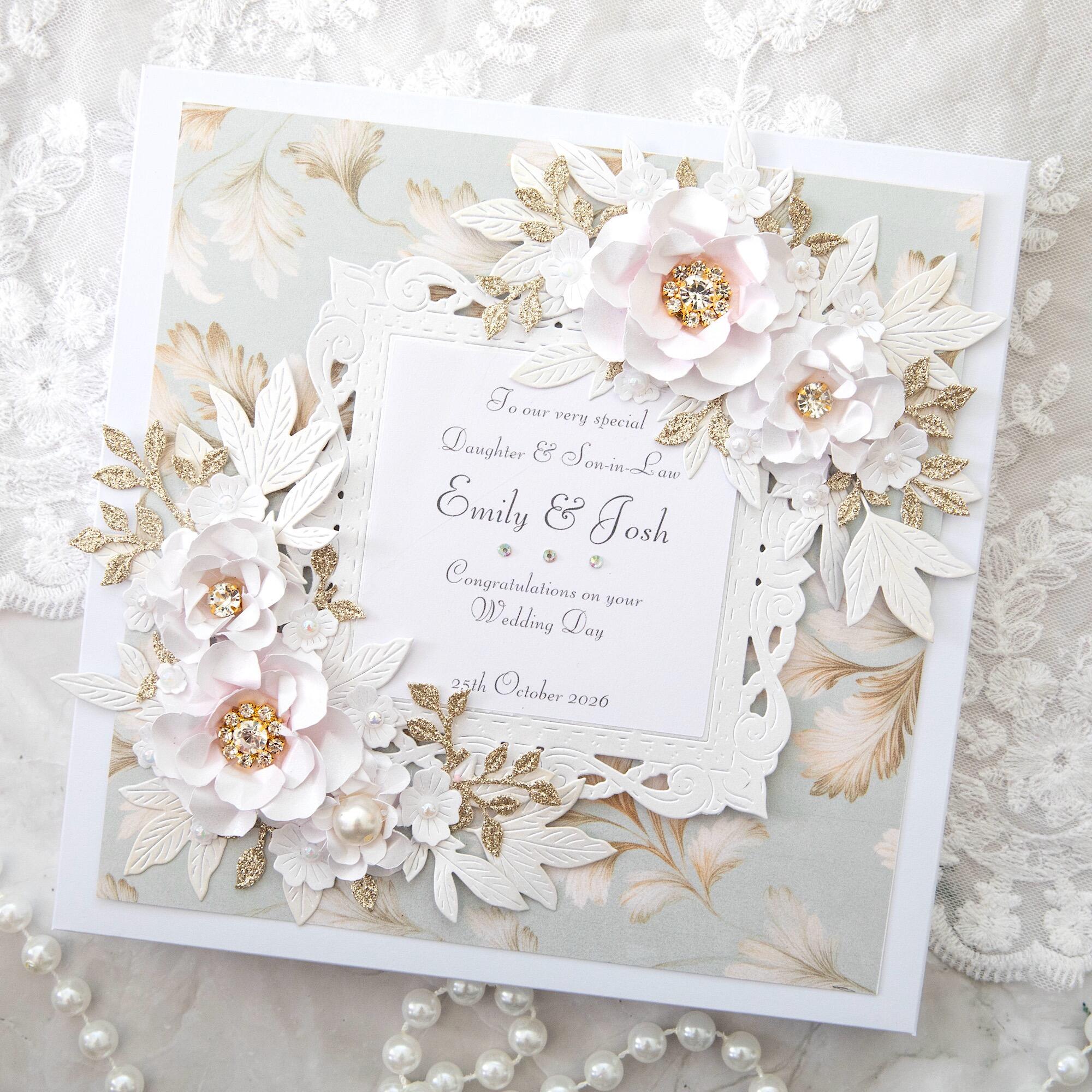 Luxury handmade personalised wedding card for daughter and son in law with 3D white and blush flowers, gold leaves, pearls and diamante, in gift box, made in Leicestershire UK