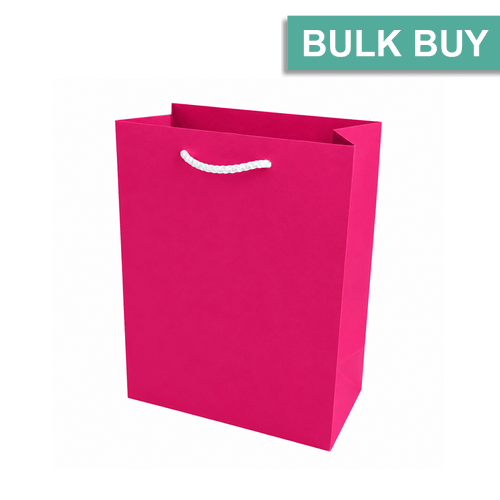 Medium hot pink gift bag on a plain white background bulk buy