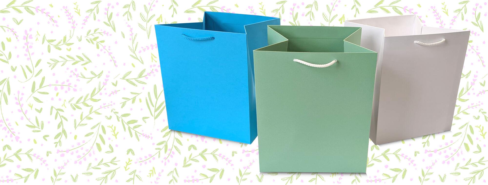 <h2>NEW LARGE SQUARE GIFT BAGS</h2><p>Perfect for flowers, footballs or fedoras - the large gusset provides endless possibilities!