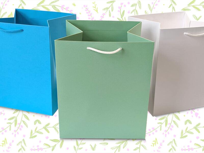 <h2>NEW LARGE SQUARE GIFT BAGS</h2><p>Perfect for flowers, footballs or fedoras - the large gusset provides endless possibilities!