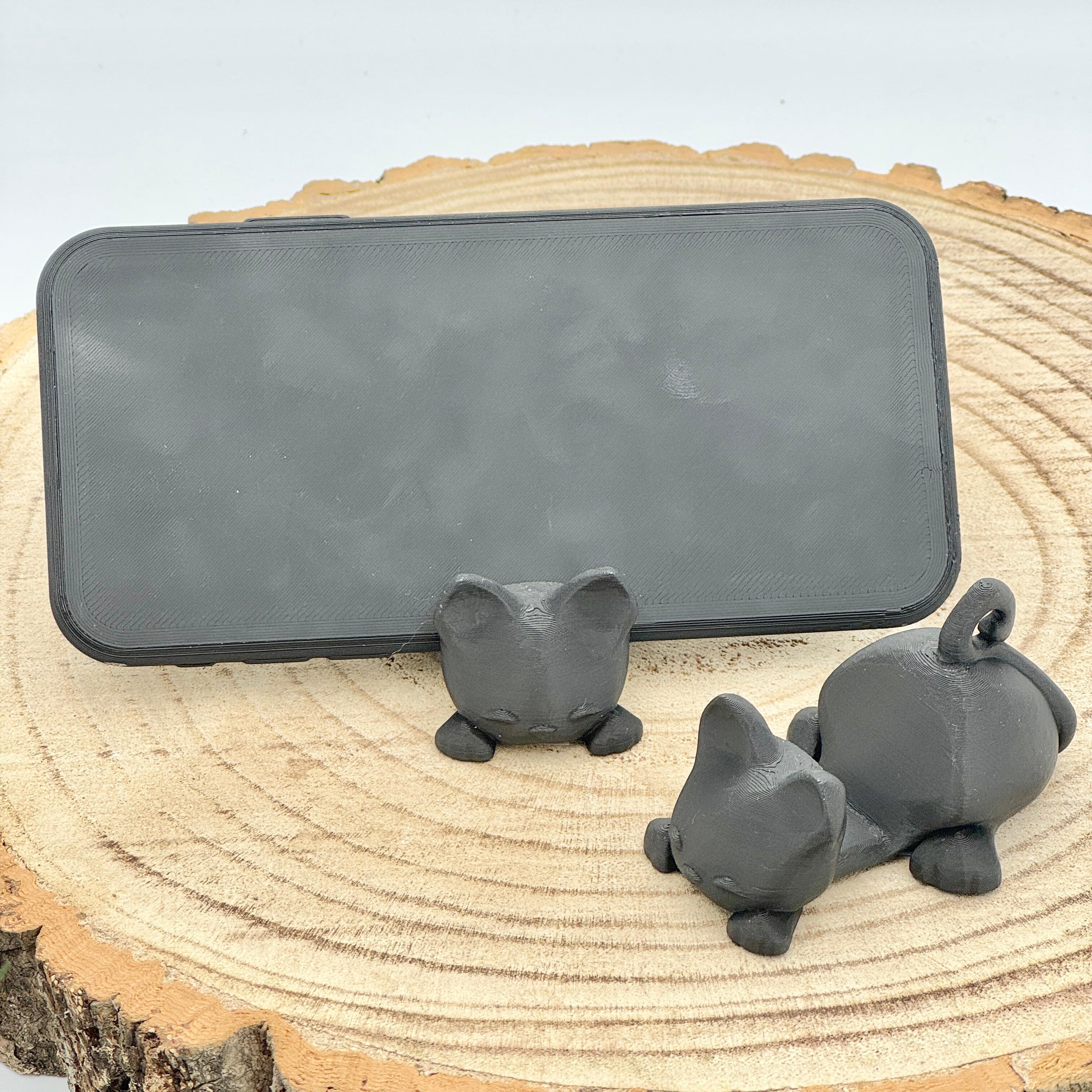 an image of a black cat mobile phone holder