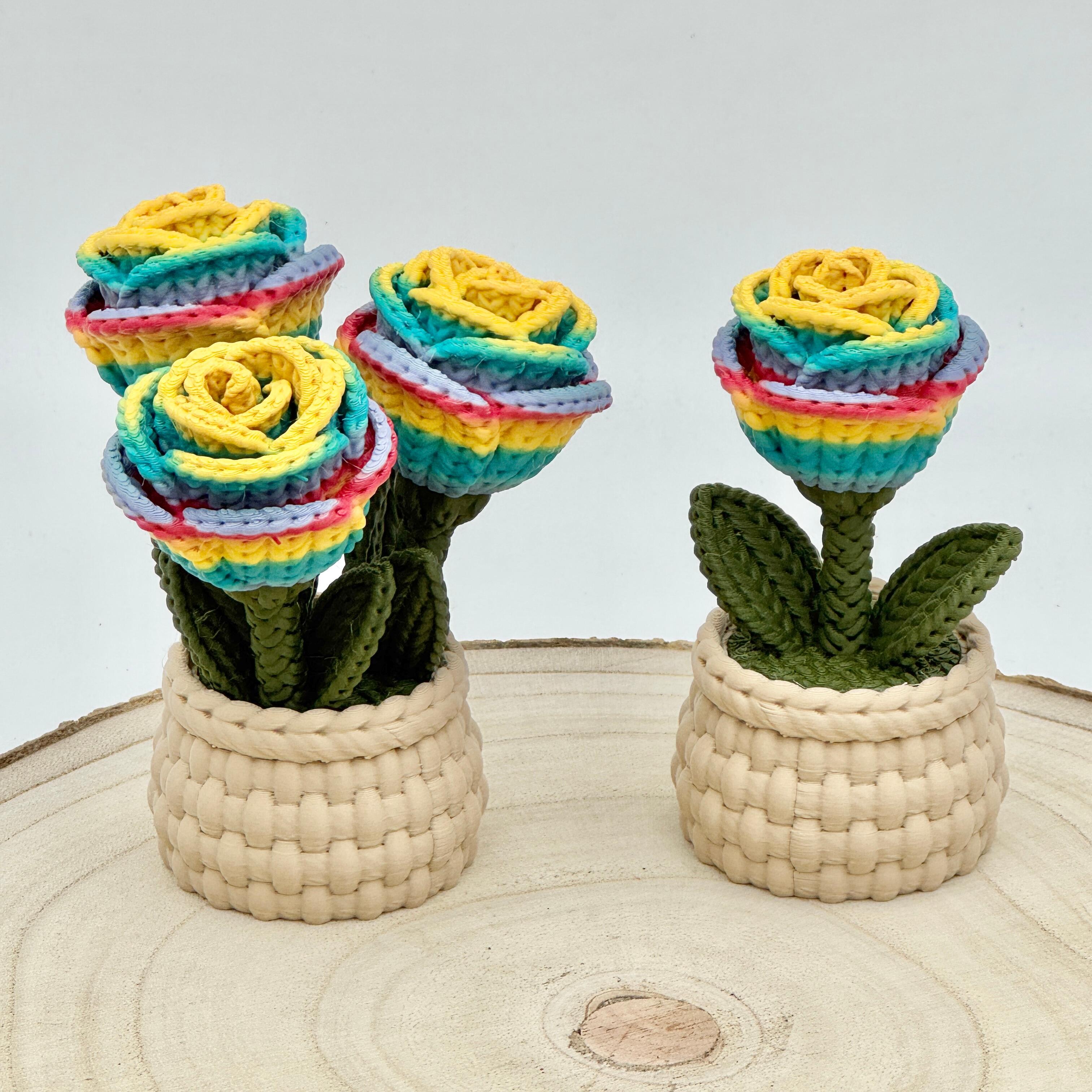 rainbow knitted effect roses in a light brown woven basket