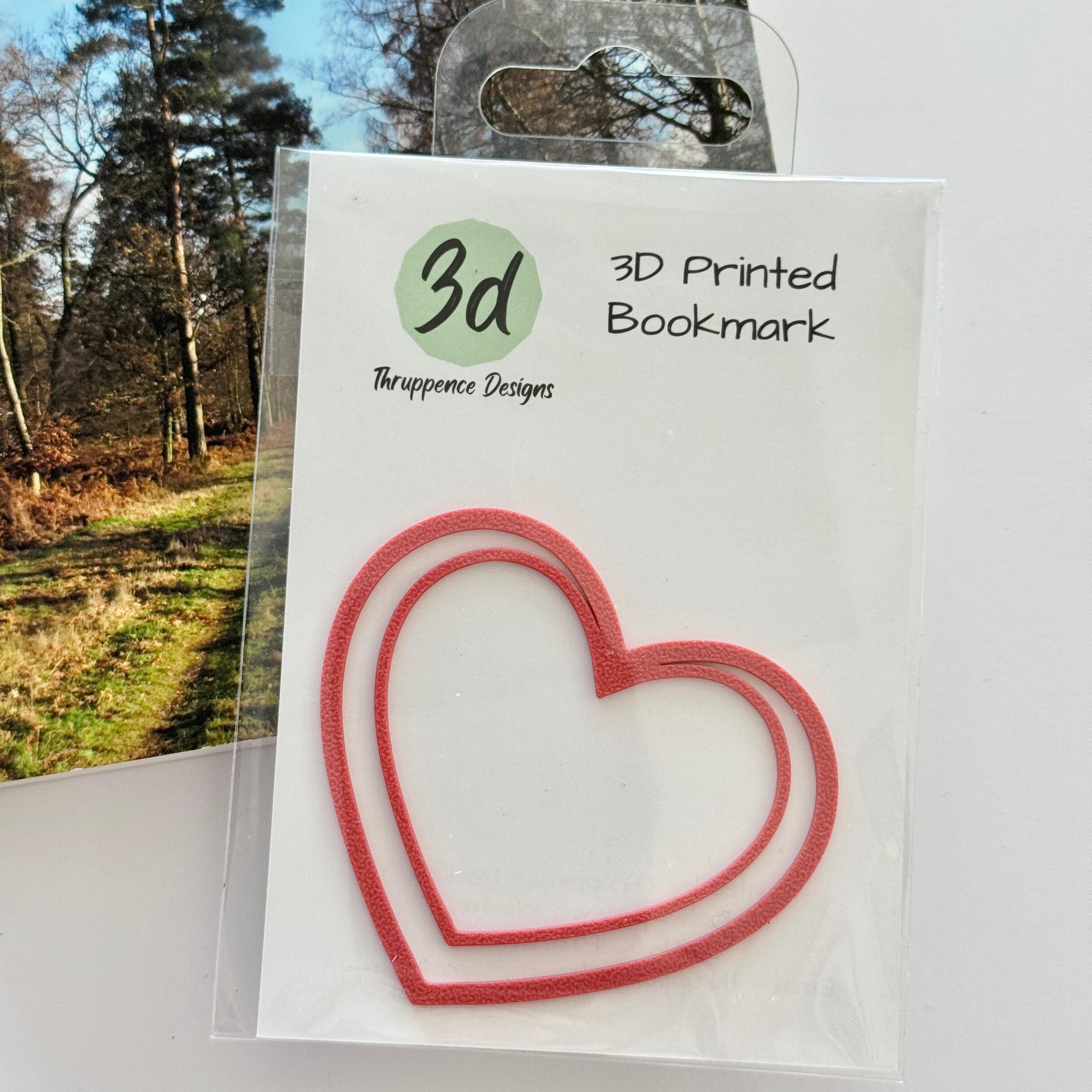 red heart shaped bookmark packaged