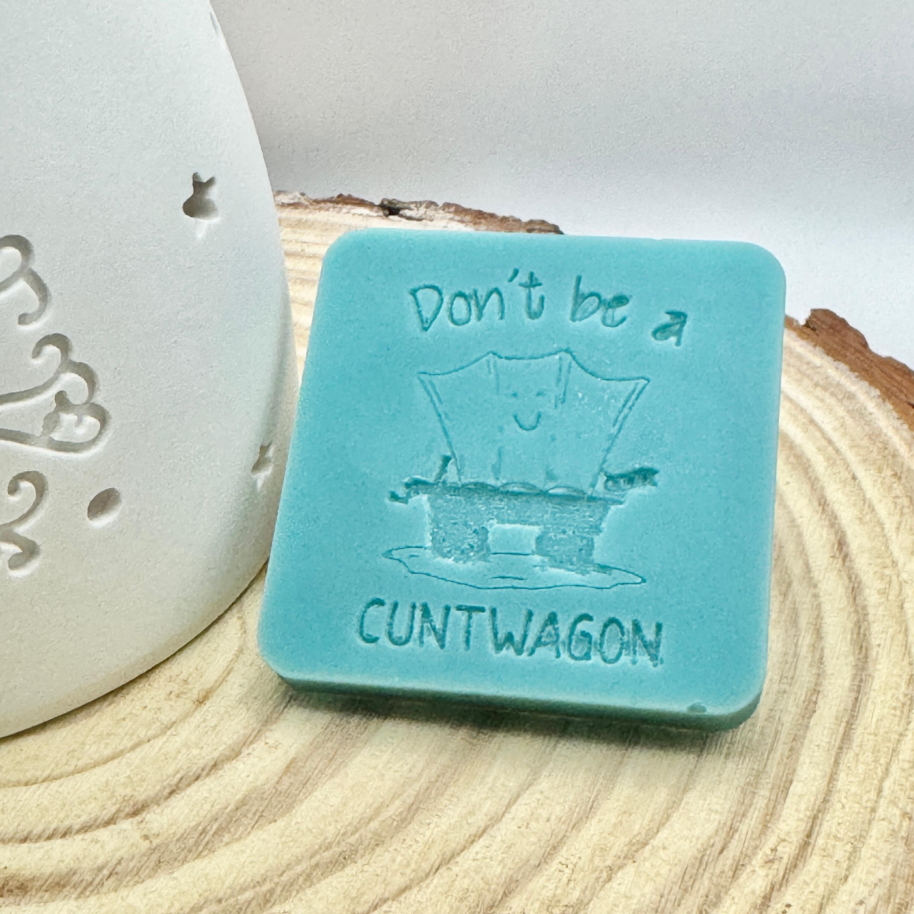 an image of a sweary wax melt square that reads cuntwagon