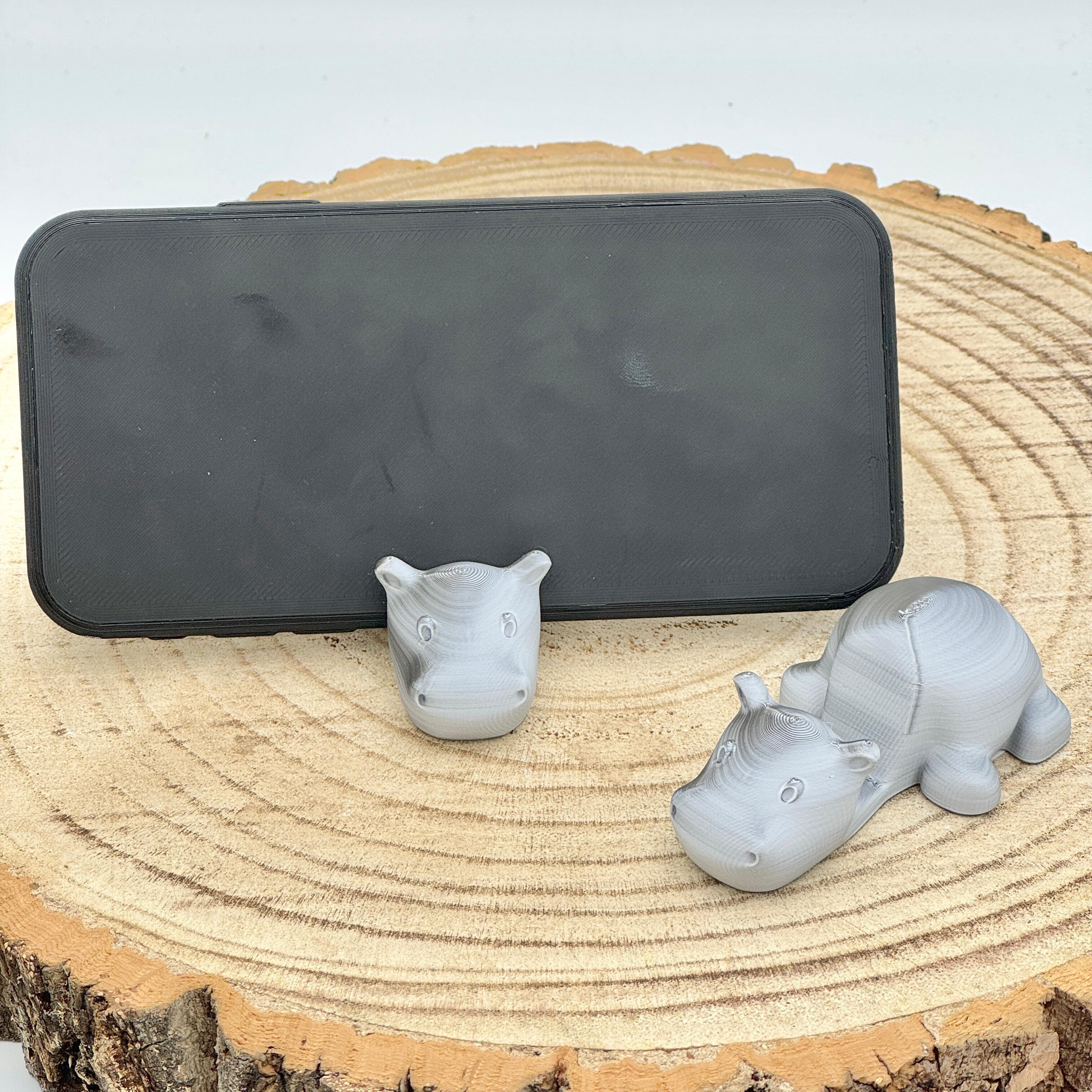 an image of a grey hippo mobile phone holder